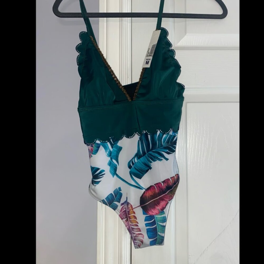 Size Medium/M Cacelin one piece green and tropical themed swimsuit
